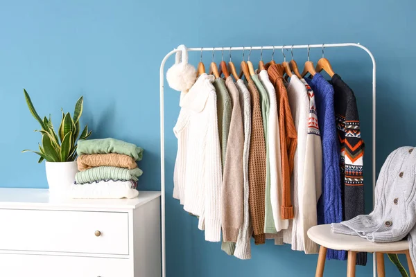 Rack Stylish Sweaters Chest Drawers Chair Color Wall — Stock Photo, Image