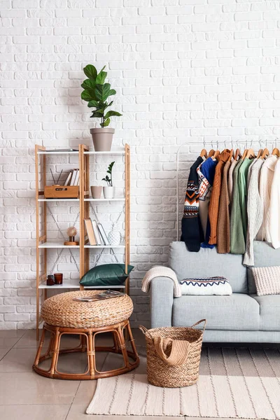 Shelf Unit Sofa Rack Sweaters White Brick Wall Living Room — Stock Photo, Image