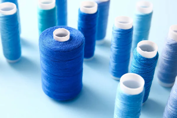 Thread Spools Blue Background Closeup — Stock Photo, Image