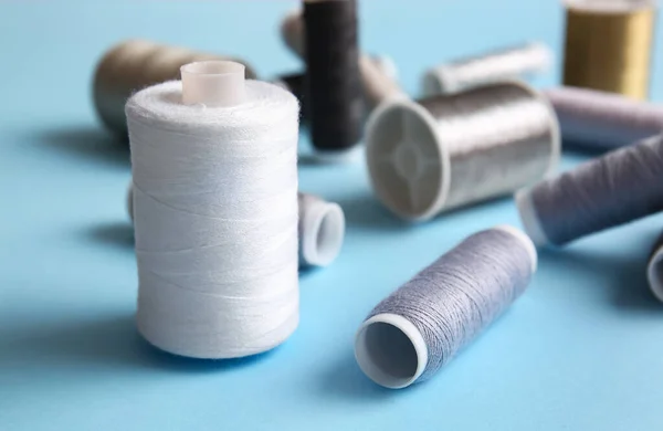 Thread Spools Blue Background Closeup — Stock Photo, Image