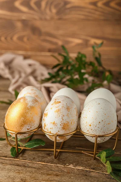 Holder Beautiful Easter Eggs Plant Leaves Wooden Table Closeup — Stock Photo, Image
