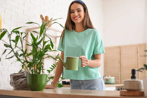 Young Woman Watering Can Houseplant Kitchen — Stock Photo, Image