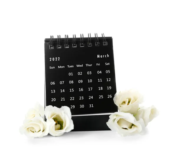 白色背景下的国际妇女节庆祝活动日历和花卉 — 图库照片