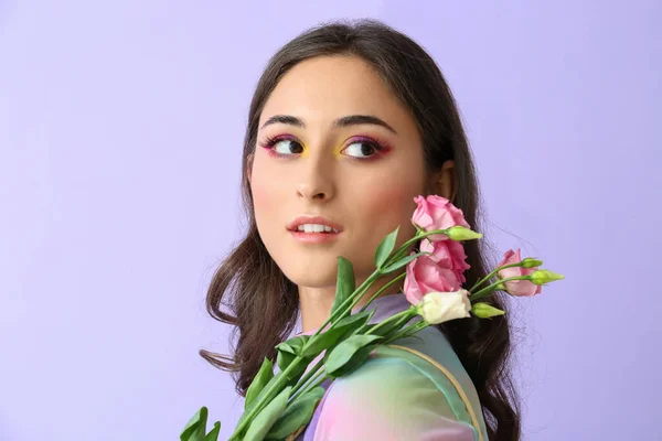 Beautiful Woman Creative Makeup Looking Aside Holding Eustoma Flowers Violet — Stock Photo, Image