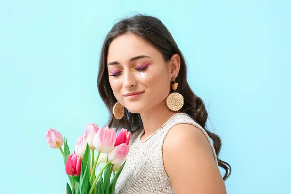 Young Woman Creative Makeup Bouquet Tulips Blue Background International Women — Stock Photo, Image