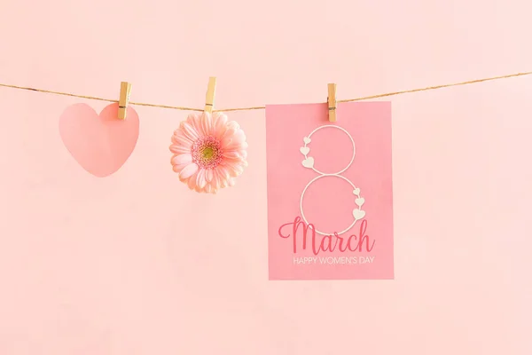 Cards International Women Day Gerbera Flower Hanging Rope Pink Background — Stock Photo, Image