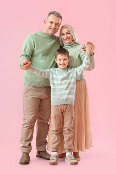 Little Boy His Grandparents Warm Sweaters Holding Hands Pink Background — Stock Photo, Image