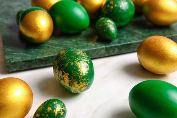 Board Stylish Easter Eggs Light Background — Stock Photo, Image
