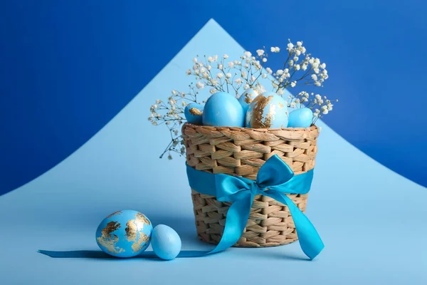 Basket Beautiful Easter Eggs Flowers Blue Background — Stock Photo, Image