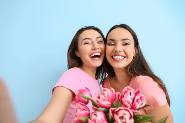 Beautiful Young Women Flowers Taking Selfie Blue Background International Women — Stock Photo, Image