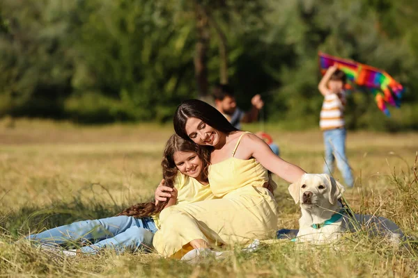 Little Girl Her Mother Cute Dog Resting Plaid Outdoors — Stock Photo, Image