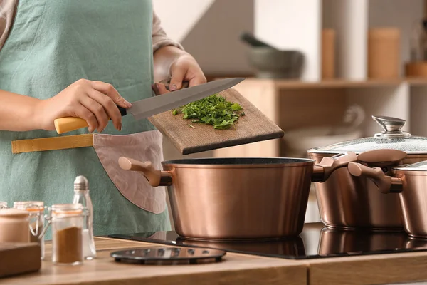 Woman Adding Greenery Cooking Pot Kitchen Closeup — Stock Photo, Image