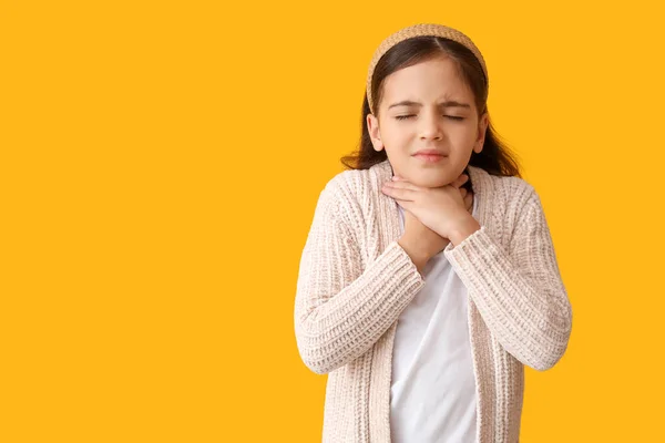 Little Girl Suffering Sore Throat Yellow Background — Stock Photo, Image