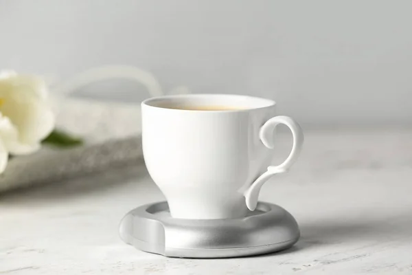 Kopje Koffie Met Verwarming Tafel — Stockfoto