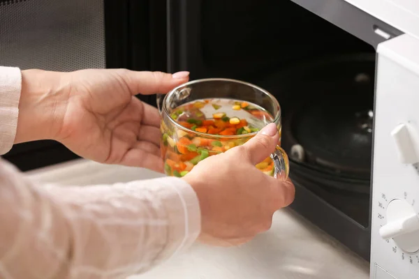 Woman Putting Cup Broth Microwave Oven Closeup — Stock Photo, Image