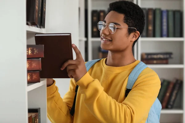 Male African American Student Taking Book Bookshelf Library — Stock Photo, Image