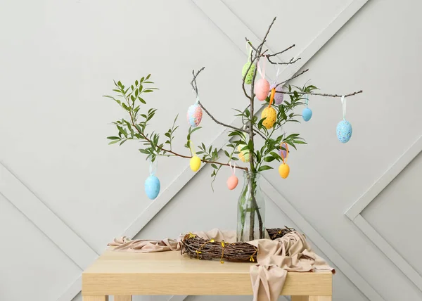 Composition Green Tree Branches Easter Eggs Table Grey Wall — Stock Photo, Image