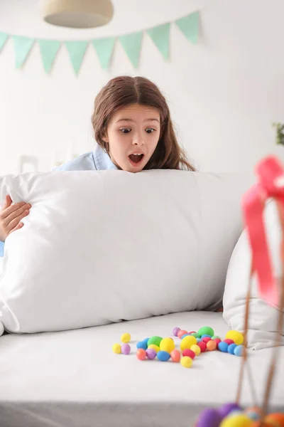 Cute Little Girl Finds Easter Eggs Pillow — Stock Photo, Image