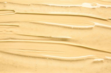 Arka plan olarak kozmetik serumun dokusu