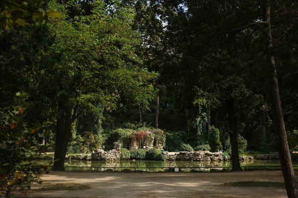 Beautiful green park on sunny summer day