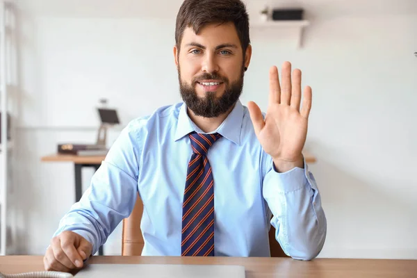 Handsome Young Businessman Waving Hand Table Office — Stock Photo, Image