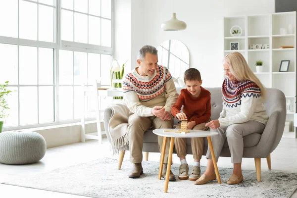 Little Boy His Grandparents Warm Sweaters Playing Jenga Game Home — Stock Photo, Image