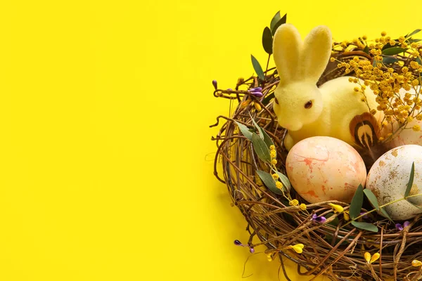 Nest Painted Easter Eggs Bunny Flowers Yellow Background Closeup — Stock Photo, Image