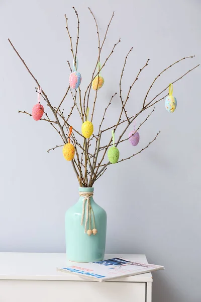 Vase Tree Branches Colorful Easter Eggs Magazine Shelf Light Wall — Stock Photo, Image