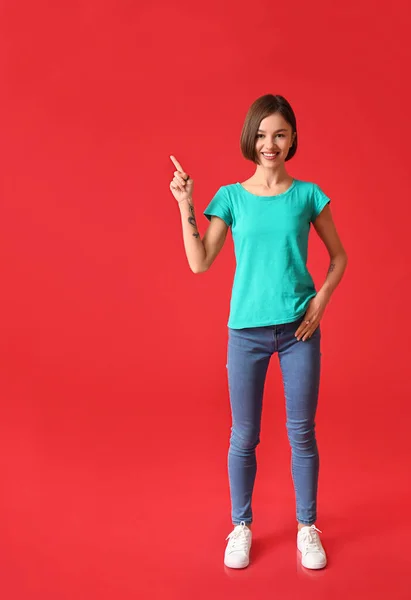 Beautiful Young Woman Stylish Shirt Pointing Something Color Background — Stock Photo, Image