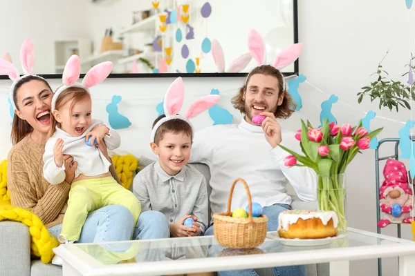 Happy Family Bunny Ears Easter Eggs Sitting Sofa Home — Stock Photo, Image