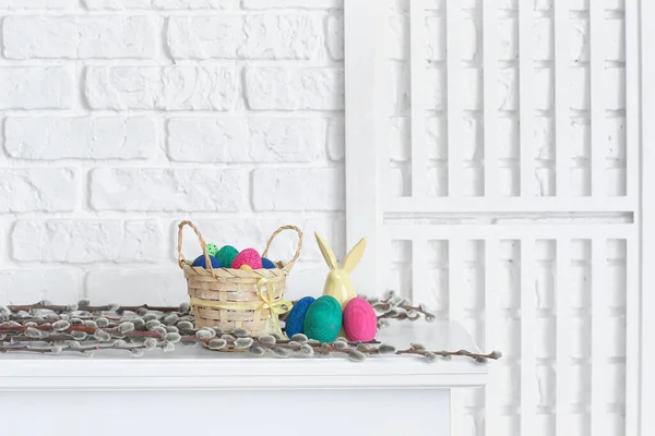 Basket Painted Easter Eggs Pussy Willow Branches Table White Brick — Stock Fotó