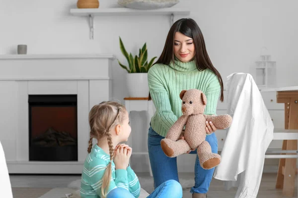 Happy Mother Giving Toy Her Little Daughter Home — Stock Photo, Image