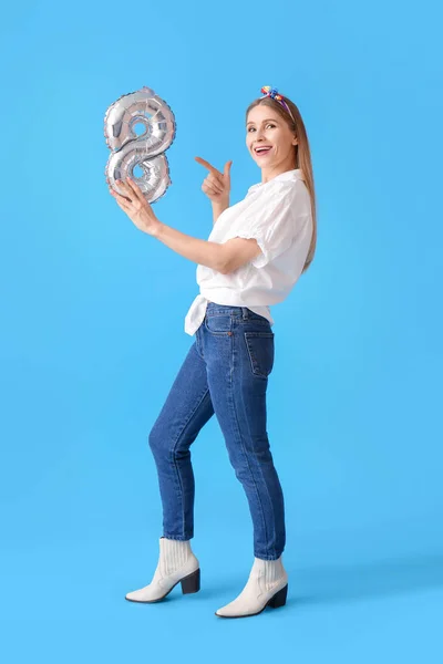 Beautiful Woman Pointing Balloon Shape Figure Blue Background International Women — Stock Photo, Image
