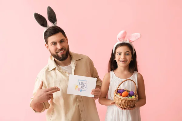 Little Girl Easter Eggs Her Father Greeting Card Pink Background — Stock Photo, Image