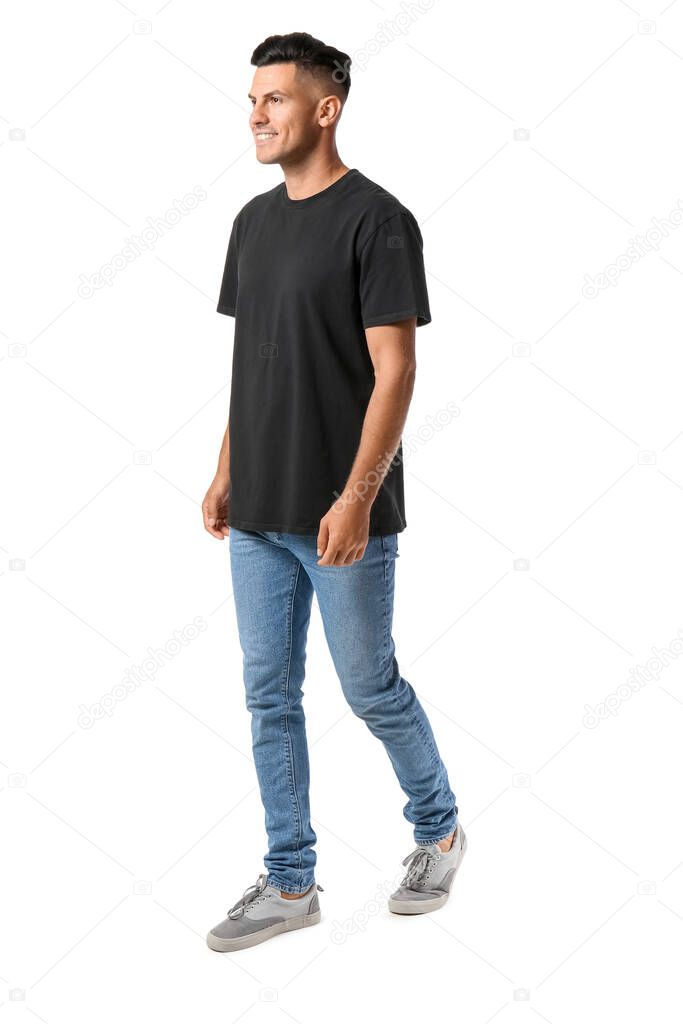 Handsome young man in stylish t-shirt isolated on white