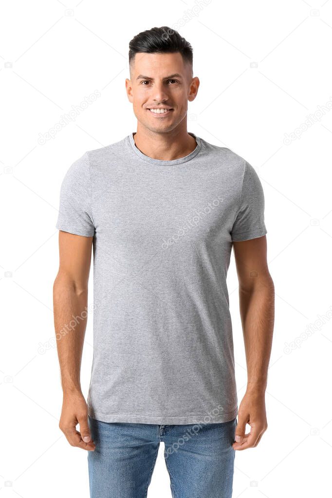 Handsome young man in stylish t-shirt isolated on white