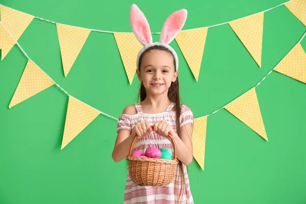 Little Girl Bunny Ears Basket Easter Eggs Green Background — Stock Photo, Image
