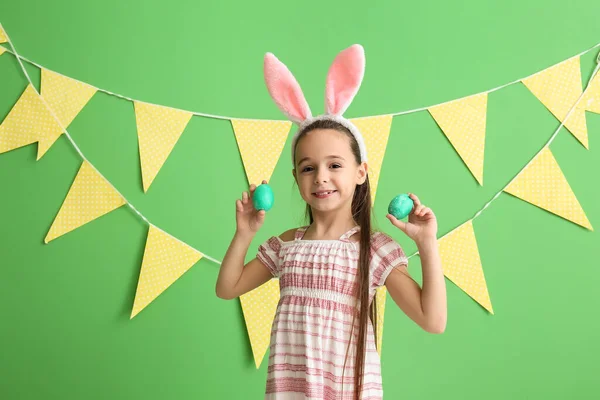 Little Girl Bunny Ears Holding Easter Eggs Green Background — Stock Photo, Image