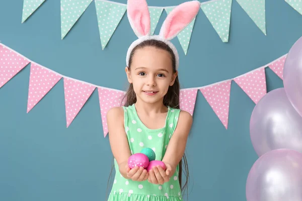 Little Girl Bunny Ears Holding Easter Eggs Blue Background — Stock Photo, Image
