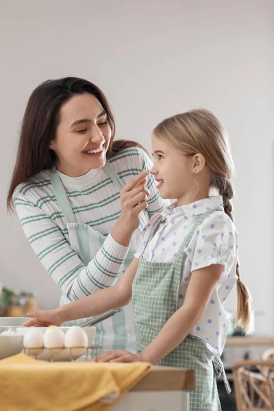 Mother Touching Her Little Daughter Nose While Cooking Kitchen Easter — Stock Photo, Image