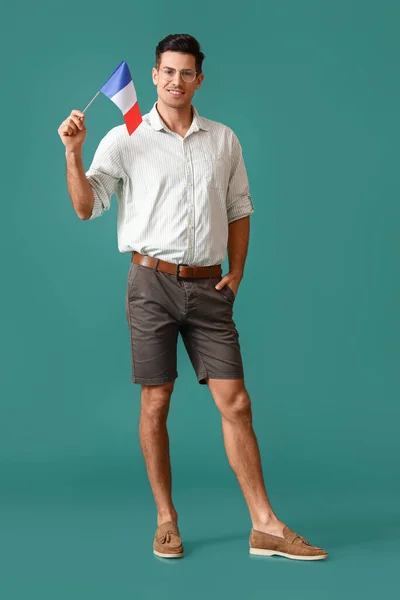 Joven Guapo Con Bandera Francia Sobre Fondo Verde —  Fotos de Stock