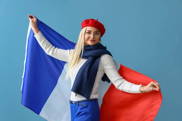 Hermosa Mujer Con Bandera Francia Sobre Fondo Azul —  Fotos de Stock