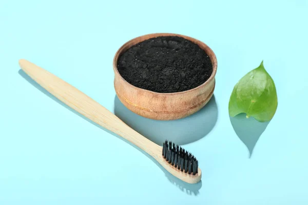 Bowl Activated Charcoal Tooth Powder Toothbrush Blue Background — Stock Photo, Image