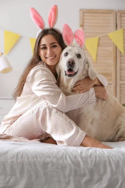 Young Woman Adorable Dog Bunny Ears Bed Home Easter Celebration — Stock Photo, Image