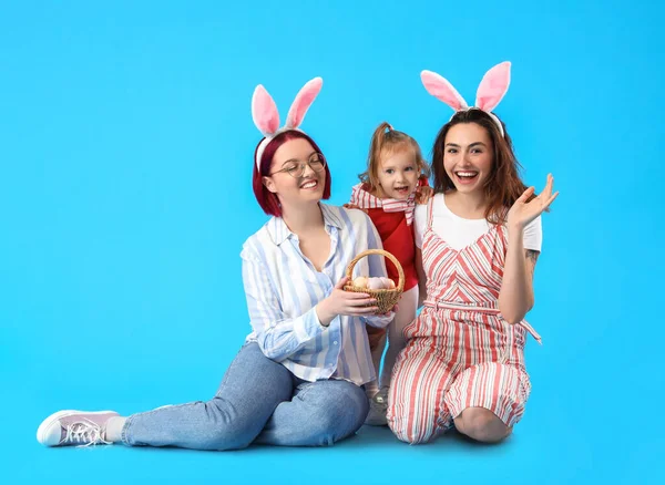 Happy Lesbian Couple Little Daughter Easter Eggs Color Background — Stock Photo, Image
