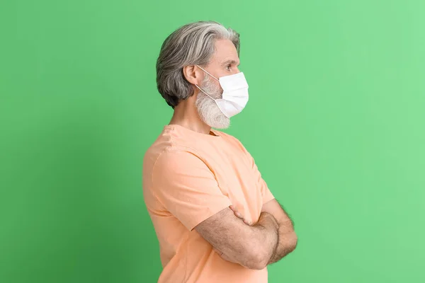 Senior Man Medical Mask Green Background — Stock Photo, Image