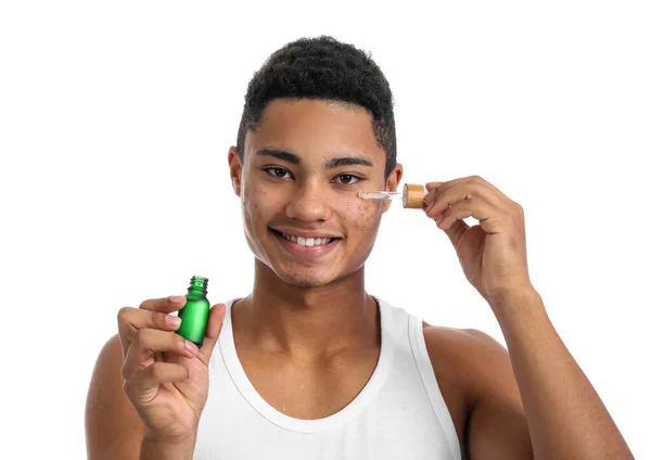 Young African American Guy Serum Skin Care White Background — Stock Photo, Image