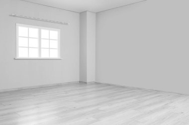 Işık duvarlı ve pencereli büyük boş oda manzarası