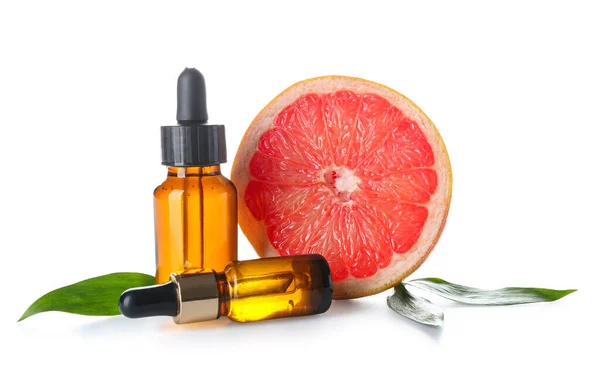 Bottles Essential Oil Half Grapefruit White Background — Stock Photo, Image