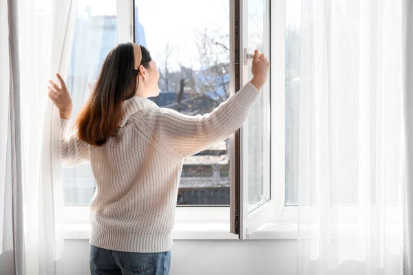 Pretty Young Asian Woman Opening Window Home — Stock Photo, Image